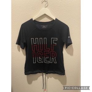 Tommy Hilfiger size xxs but runs big. Navy blue with a belt style with string